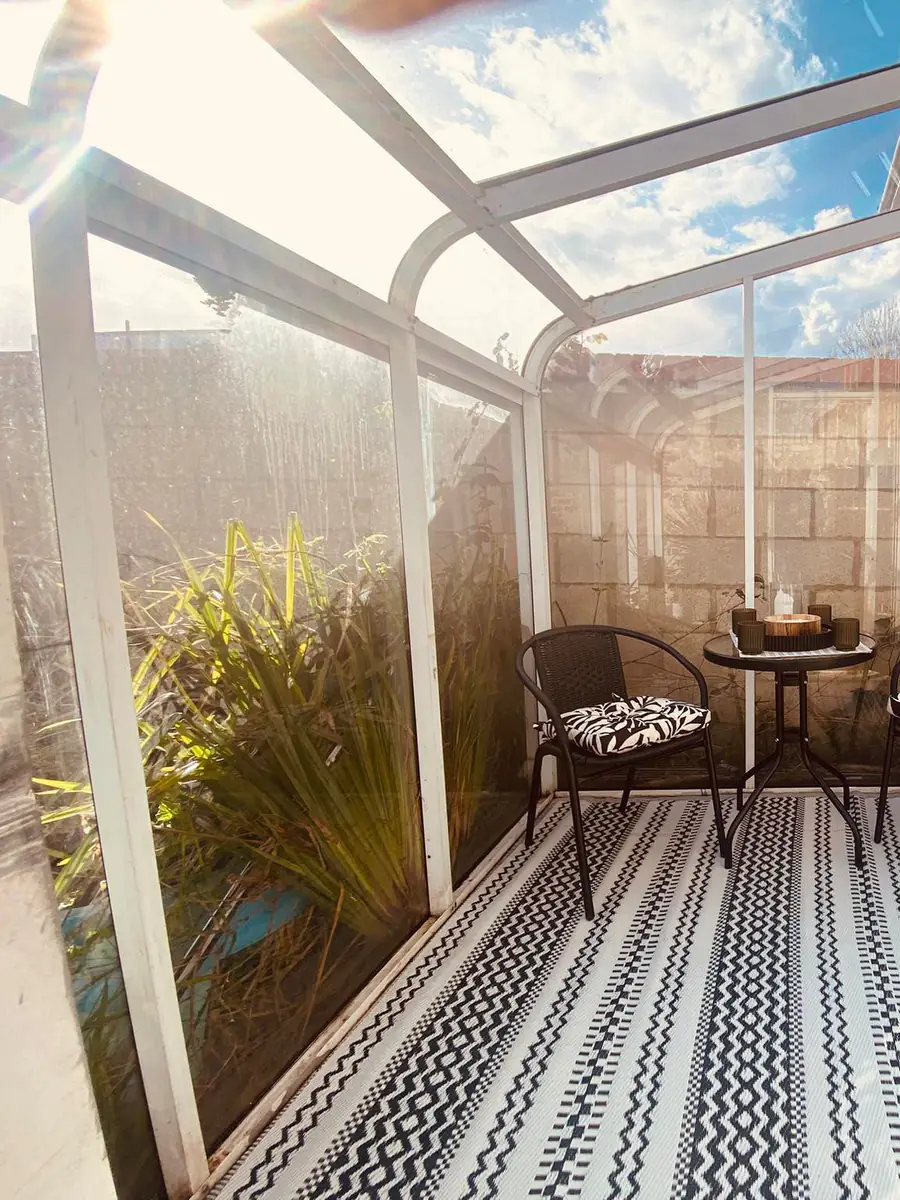 Same conservatory cleared, swept and usable again