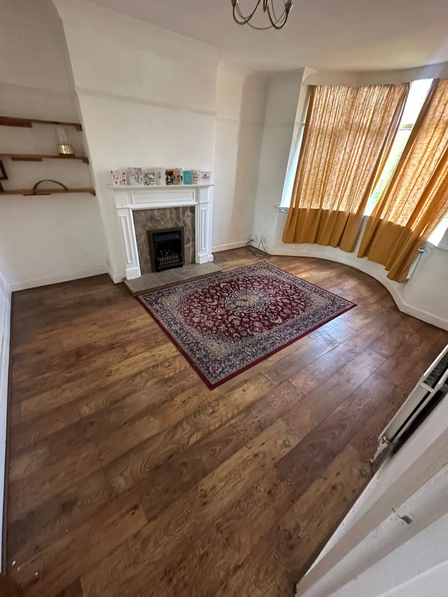 Same living room emptied and ready for handover after Mukin house clearance