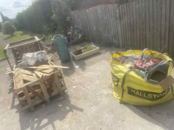 Builders bag of mixed construction waste and timber offcuts cleared by Mukin in York