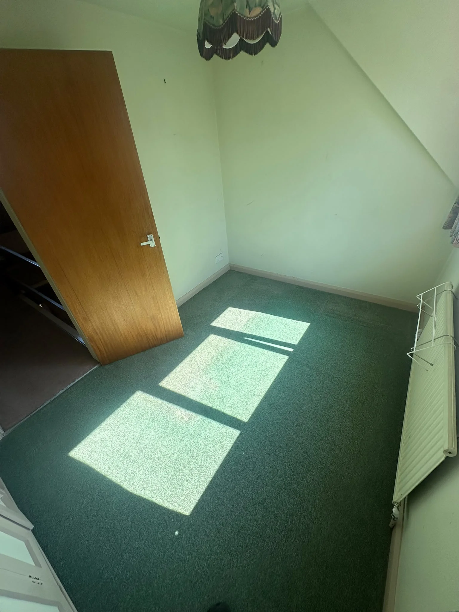 Kids bedroom after clearance, cleared back to bare carpet